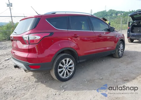 2017 Ford Escape Titanium z USA, uszkodzony, nr VIN 1FMCU9J99HUC41851